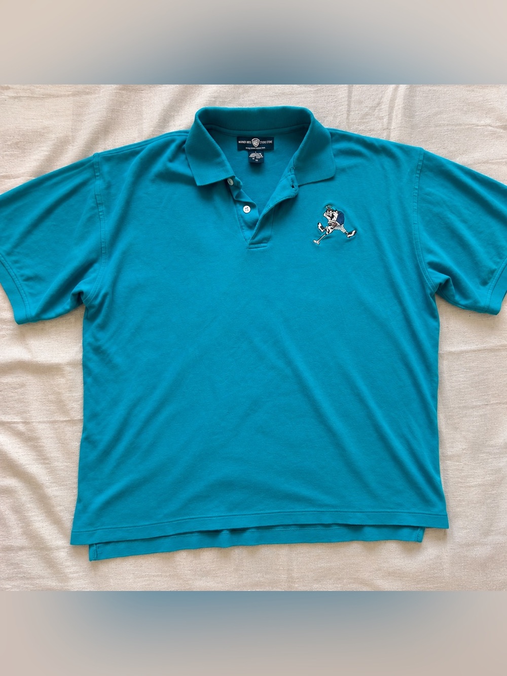 VTG Warner Bros. Teal Short-Sleeve Polo Shirt GOLFING TAZ